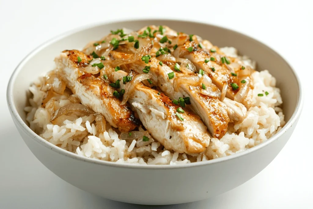 A single serving of french onion chicken and rice recipe presented in a shallow bowl.