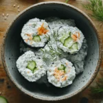 Overhead view of fresh homemade tzatziki with cucumber and dill, asking the question: is tzatziki good for a diet?